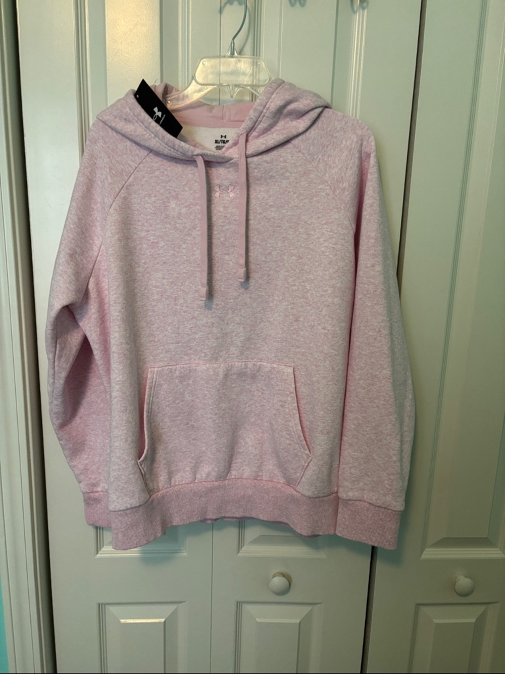 Women’s Under Armour Light Pink Hoodie with Subtle Logo Size XL.